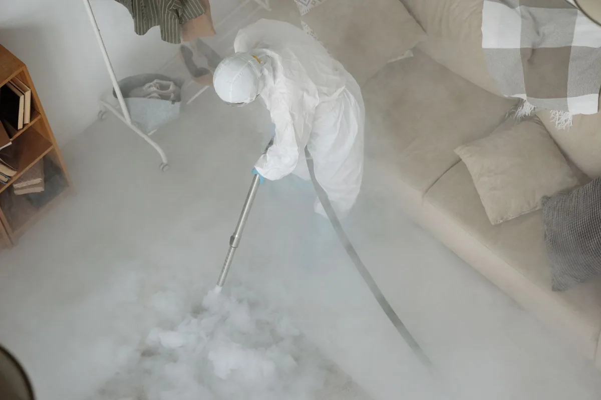 Biohazard cleanup technician in protective equipment, Gotha, FL